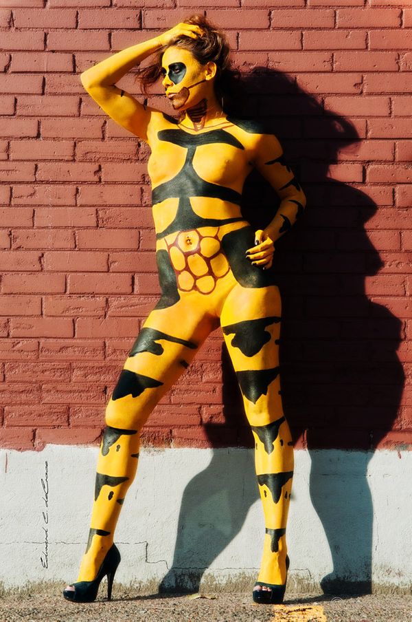 Denver model photographers composed compelling image of model wearing body paint. Model Photography As Bee