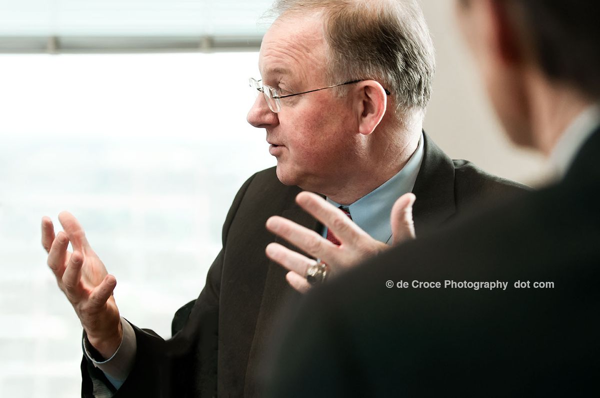Corporate photographers in Denver Colorado capture editorial photography during business meeting for Petrie partners. Photojournalism provided advertising agency designers at Spine LLC uncommon photo-imagery for adverts annual reports and websites. Corporate Photography Denver Colorado