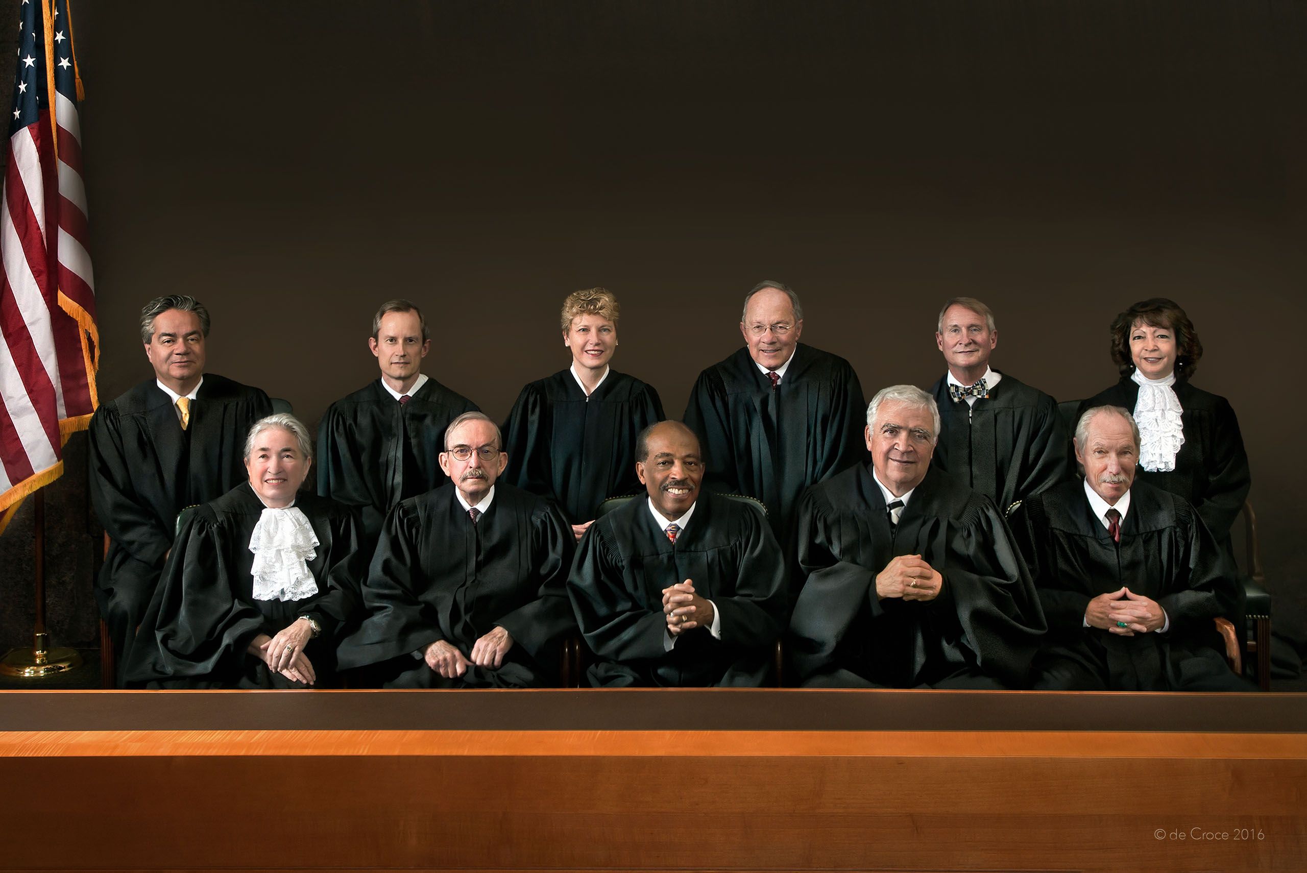 Denver Colorado portrait and corporate photographer, Edward DeCroce composes group photography in Denver's 10th Circuit Court for federal judges official portrait Federal Court Group Photography