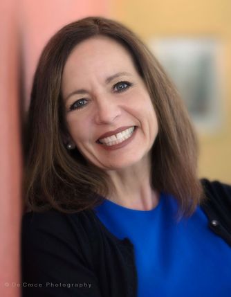 Denver photography business portrait features delightful professional woman. Denver Photography Business portrait