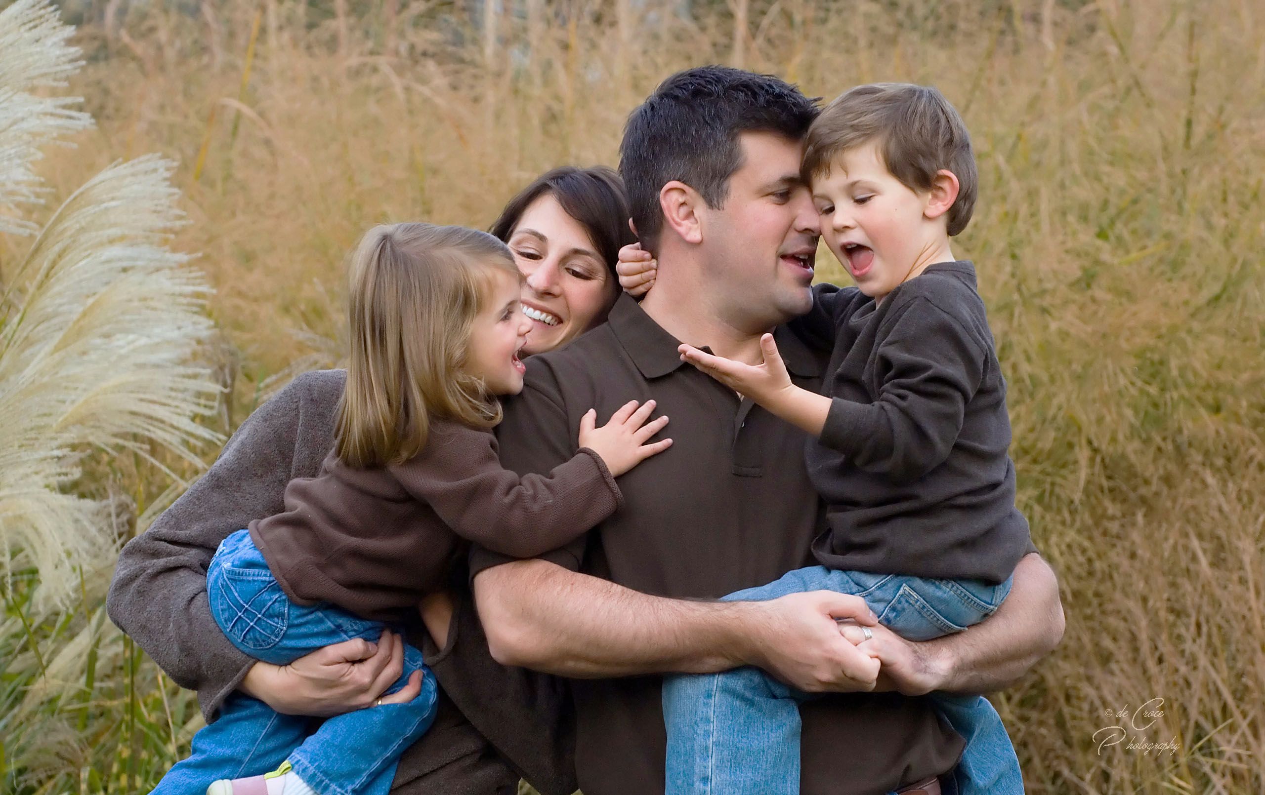 Young Family Portrait Photography Outdoor Fun.jpg