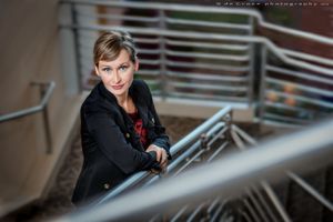 This stunning business portrait of Misty Lynes-Orzech was done as part of a marketing photography Denver Colorado project for Optis. "Executive On Stairs " ©2015 was made by Denver photographer DeCroce. Corporate Denver Photography On Stairs