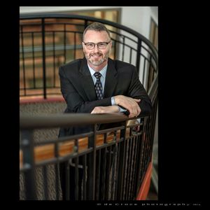 A captivating portrait of DU Law Professor was made by Denver business portrait photographer DeCroce. Law professor Byron Hammond