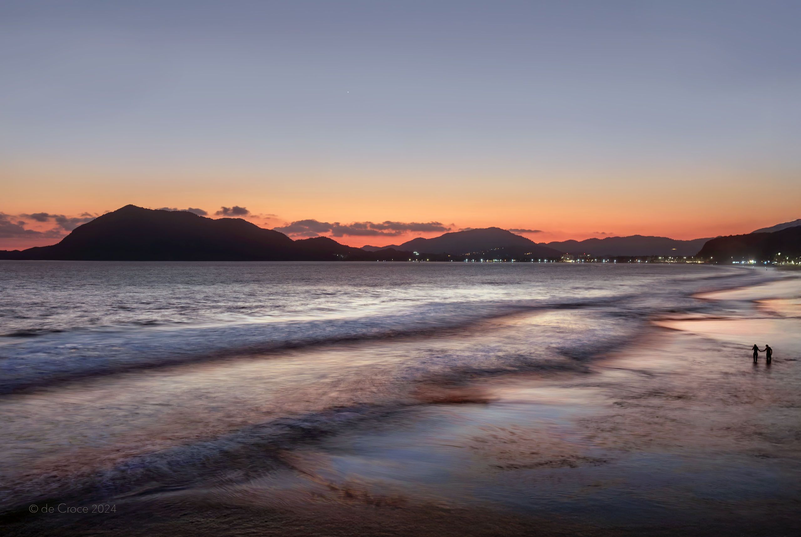 Lovers on beach under dusk sunset express romance in this travel photography advertisement for adventure company. Love On Mexico Beach Colima - Travel Lifestyle Photography