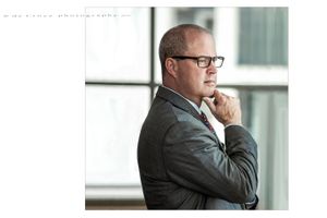 Executive portrait photographer based in Denver create intriguing composition of Accenture executive portrait on location. Accenture Executive Portrait