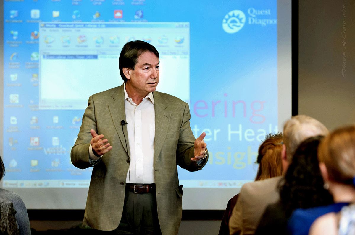 Denver photographers business from DeCroce capture Quest Diagnostic CEO Stephen H. Rusckowski during corporate speach. Business speaker - Stephen Rusckowski