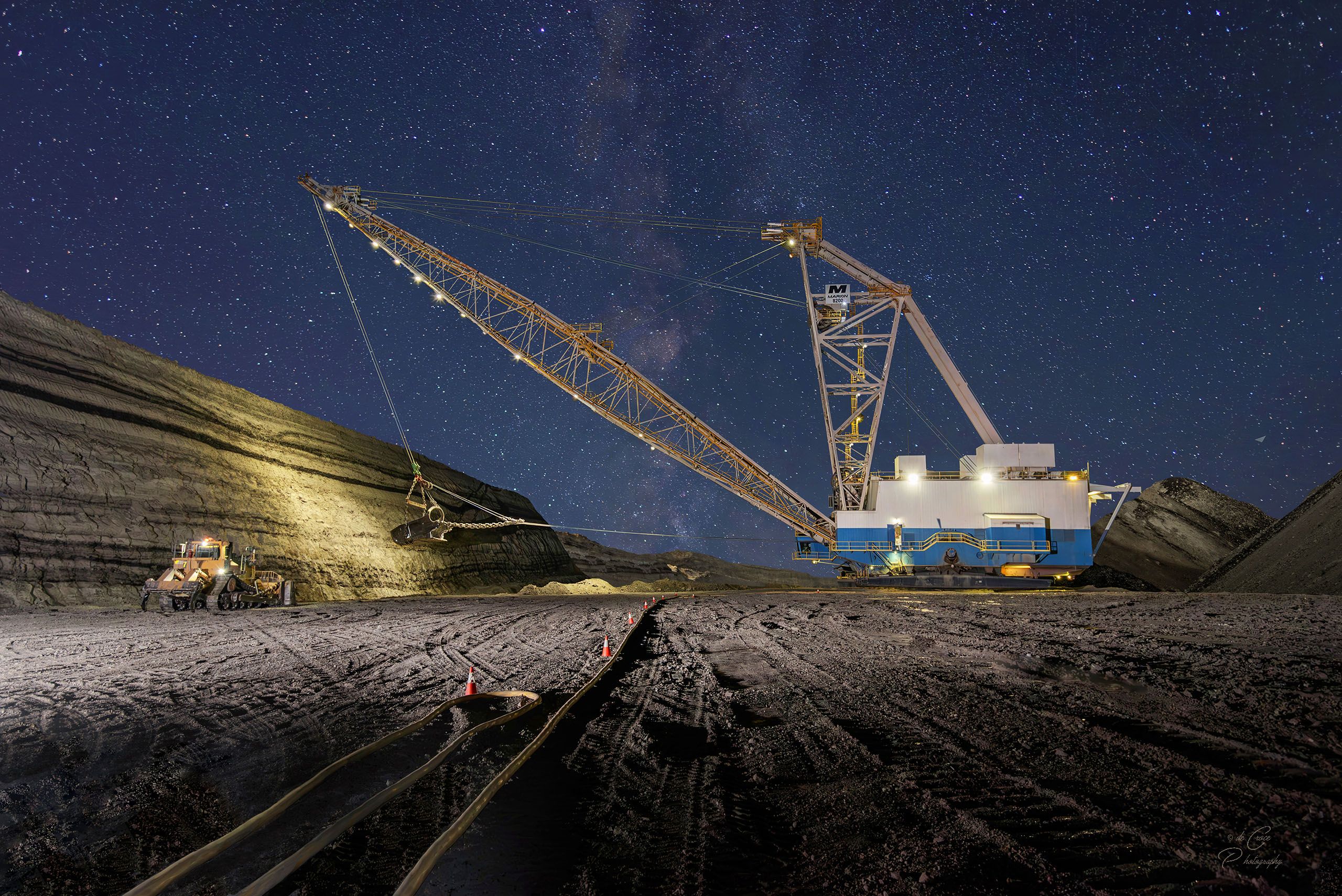 American mining photographer displays heavy equipment in winning shot for client.