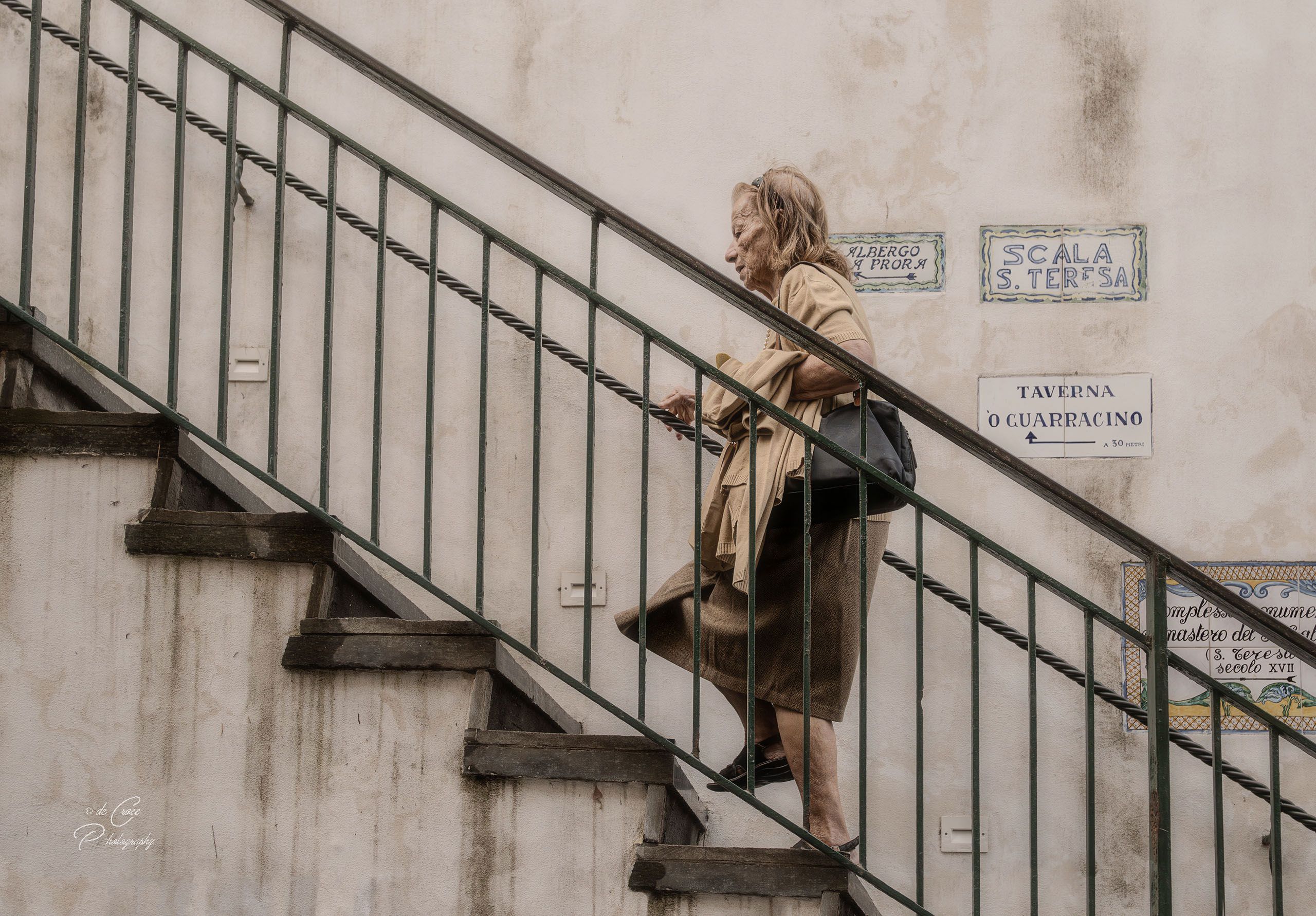 Woman Climbs Strairs Capri Italy 2.jpg