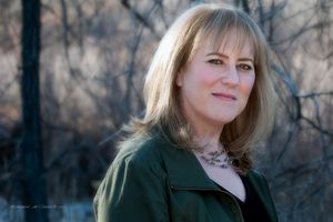 Portrait of female entrepreneur was done by the Denver executive photographer deCroce. casual_executive_portrait