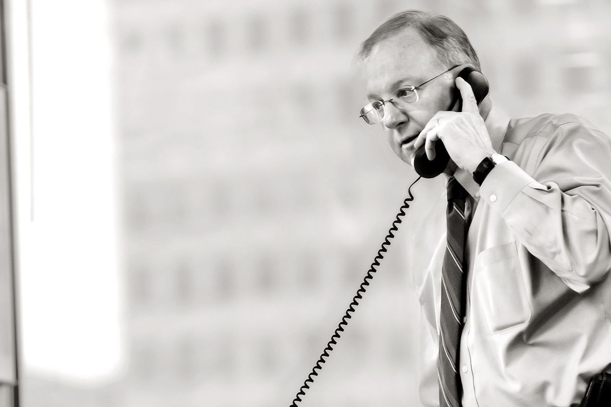 Denver corporate photographers capture editorial imagery of Tom Petrie of Petrie Partners in office. Executive Conversation