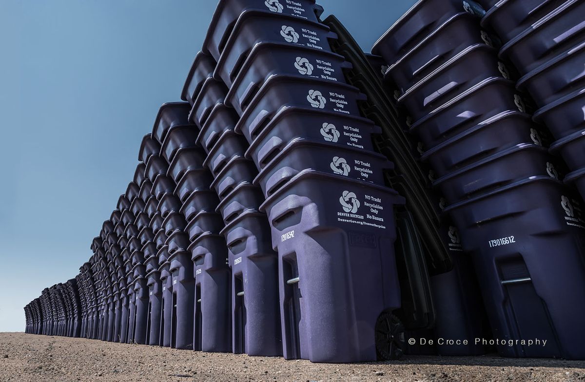 Denver recycle carts stacked for commercial photography. The image comes from a photoshoot I did for The Recycling Parntership. Purple and Blue Photo