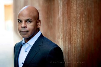 This interesting modern style head-shot business portrait was captured on location in Denver. Business Executive Portrait Photography