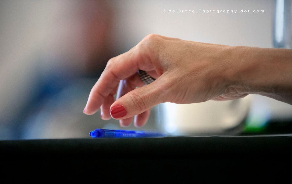 Denver photographers for corporate metting editorial photography captured "Hand & Pen" for business marketing project. Corporate photographers Denver - Hand & Pen.jpg