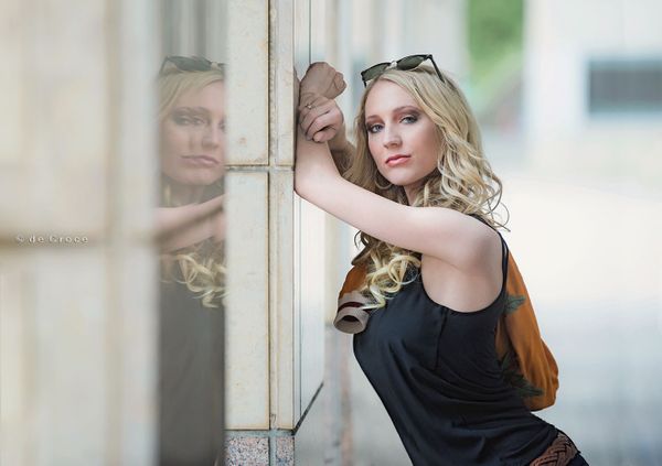 Denver Model Nicole strikes confident pose. Model Denver Photography