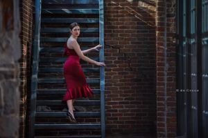 Denver dancer Camilla Susser ascends stairs in model photo-shoot project by DeCroce. Denver model art