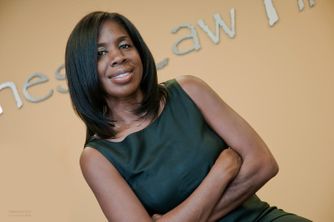 This modern business portrait headshot photography of African American attorney of April Jones was created at the Jones Law Firm by Denver business portrait head-shot photographers at DeCroce. African American Attorney Portrait Photography