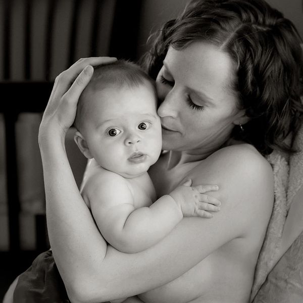 Denver Home Portrait Photographer Nursing Mother.jpg