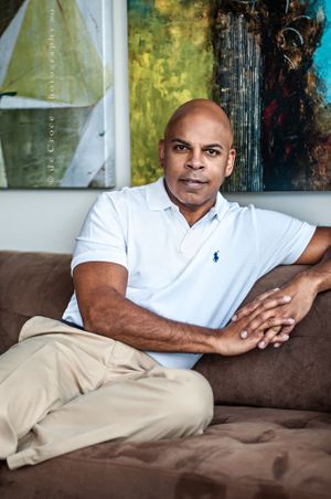Executive portrait photographer DeCroce of Denver, captures handsome executive in home photo-shoot. Executive Portrait Photography - Home