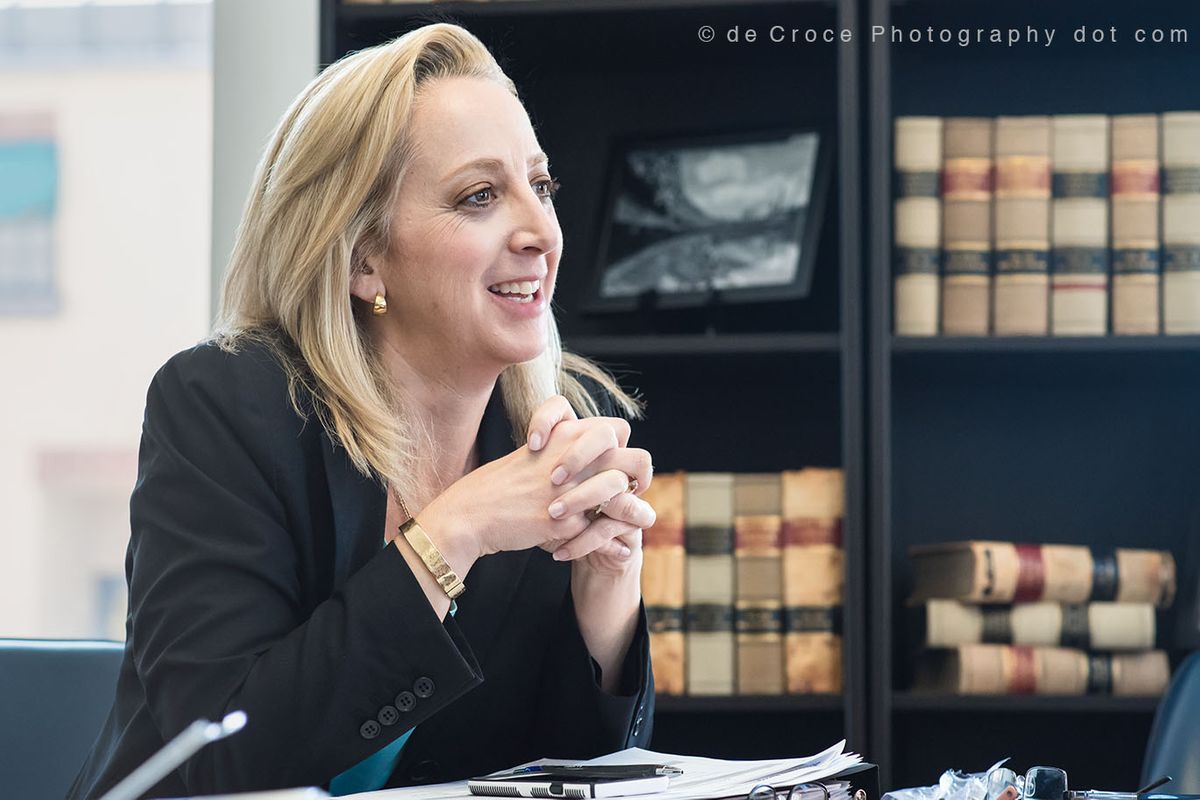Professional photographers in Denver from DeCroce create corporate business marketing photography for Denver Law firm of K&W partner Julie Walker. Denver Business Attorney Photography