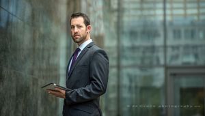 Corporate Denver photographer DeCroce created "Executive With Pad" in 2015 for Kelly & Walker LLC. The business portrait is part of a collection of corporate images created for the firm. Corporate Photyography - Executive With Pad ©2015