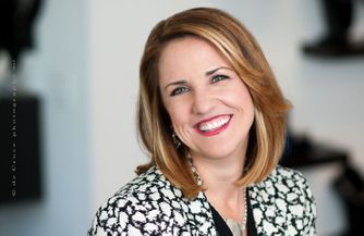 This vivacious portrait of a successful woman entrepreneur was captured at the Style Studio of Keri Blair. Woman Entreprenuer Portrait