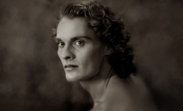 The male model herein is actually a DTDT male dancer. The head and shoulders portrait has received rave reviews from other Denver fashion photographers. Male Dancer - Model