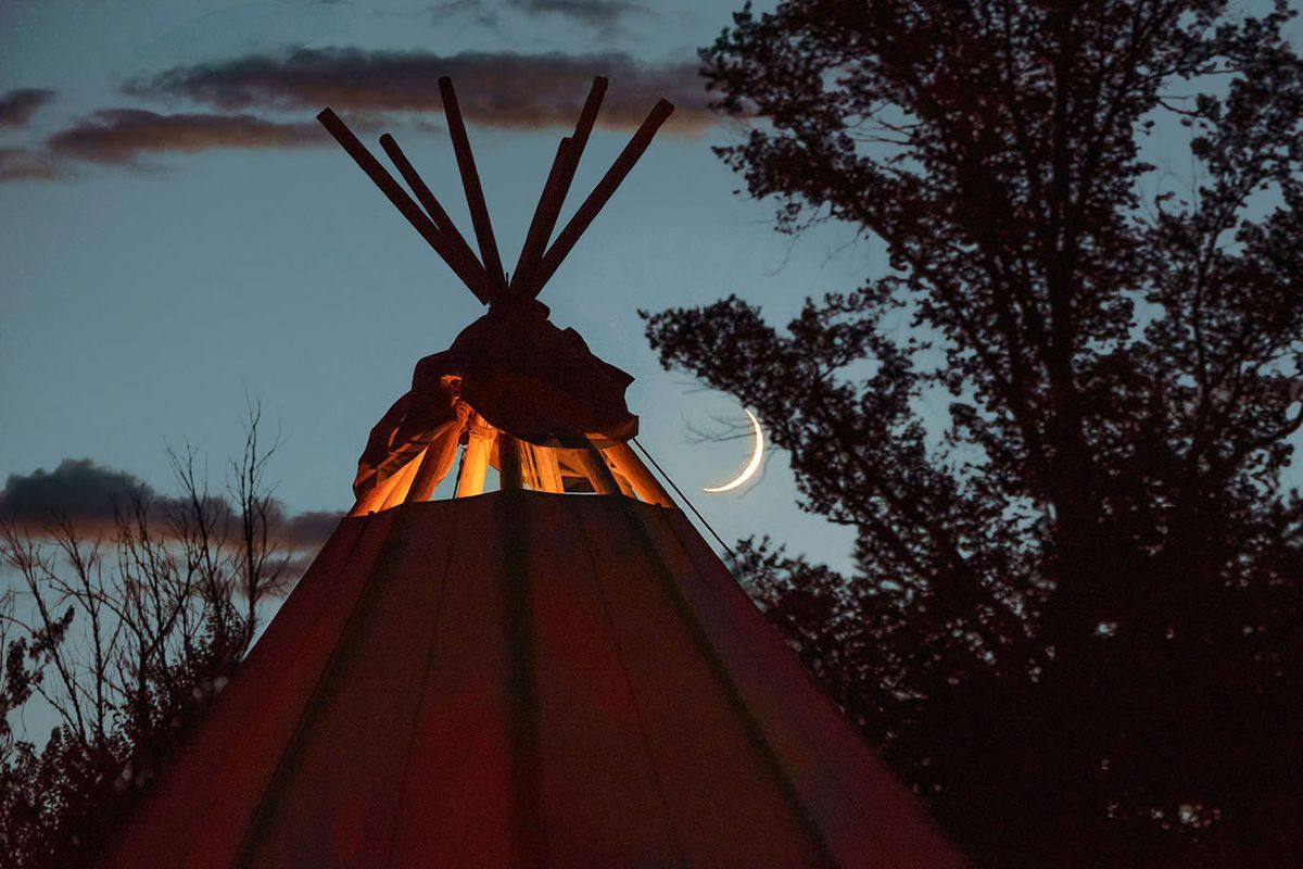 Editorial Photography Teepee and Moon is an image captured at the gates Center for Regenerative Medicine annual ourdoor picnic. Editorial Photographer Teepee & Moon