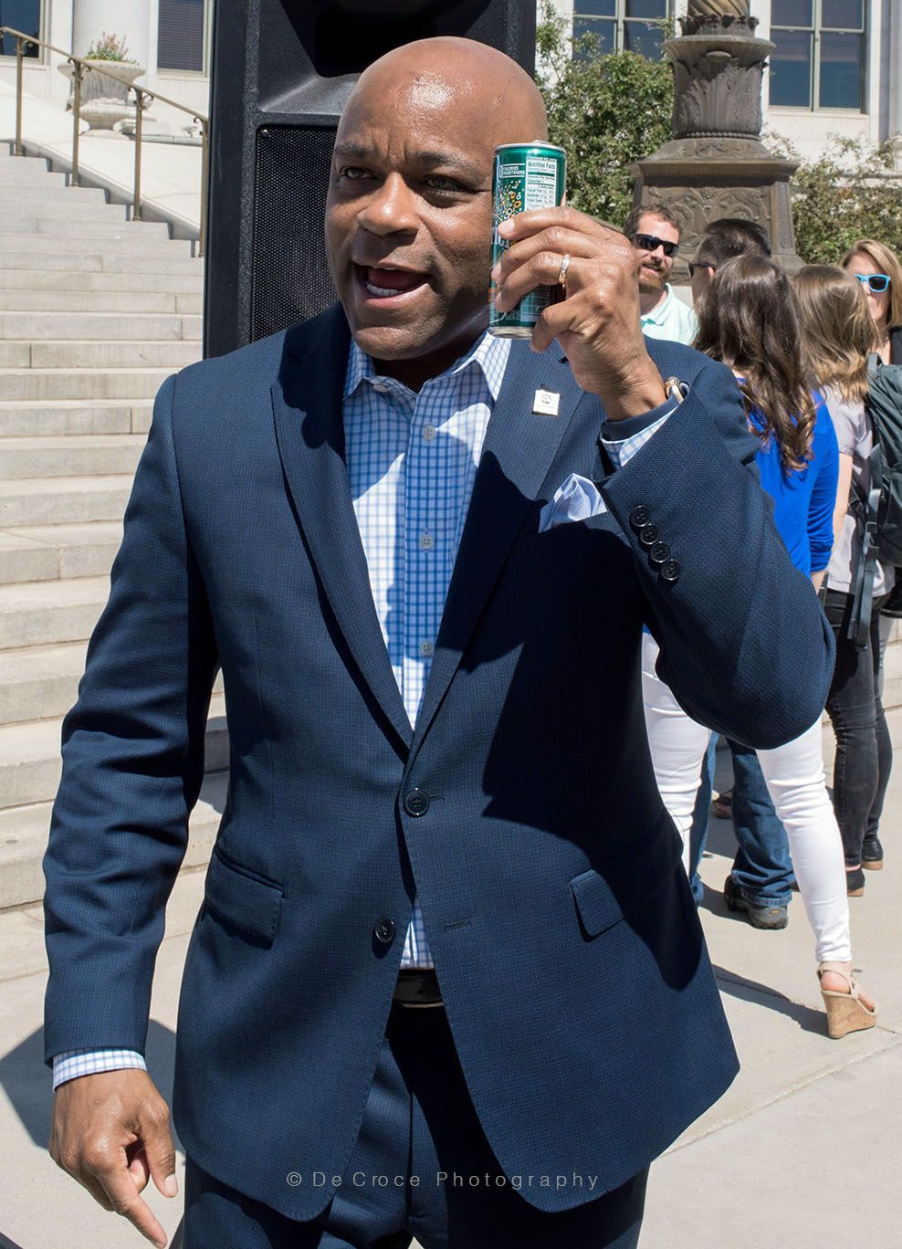 reportrage photography of Denver mayor Handcock in recycling rally at city civic center. Reportage Photography Mayor Handcock