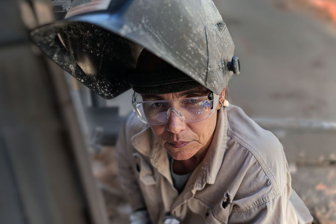 Female Welder Portrait.
