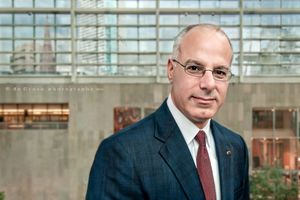 This uncommon business portrait in Denver of CEO Greg Anton combines an interesting portrait head-shot pose with a complicated background. CEO Portrait Photography - Greg Anton