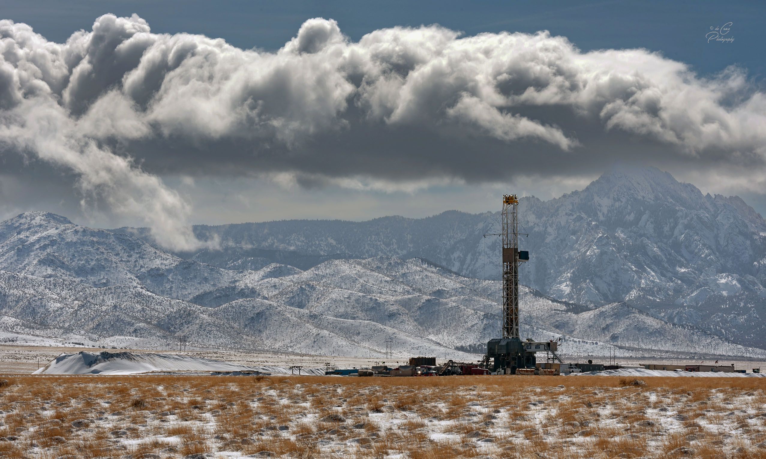 Thermal Drilling Derrick Mountain Clouds