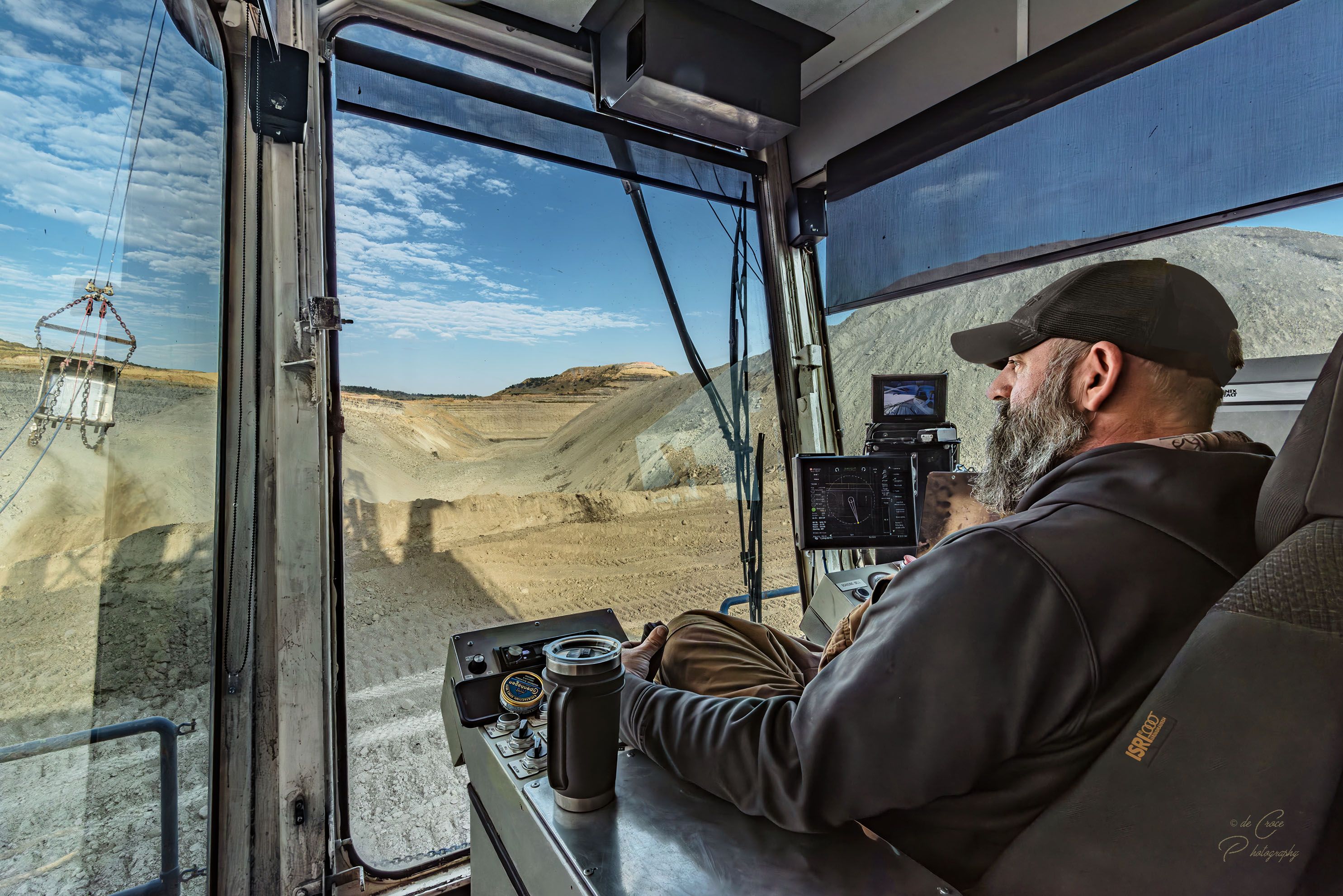 Open pit coal miner operates dragline in Montana coal operated by NTEC Dragline Operator Montana Coal