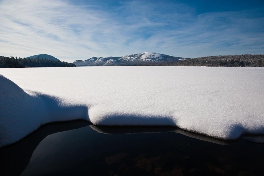 The edge of the ice on Eagle Lake in Acadia National Park.