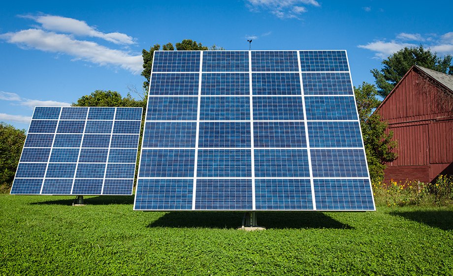 Solar panels and red barn