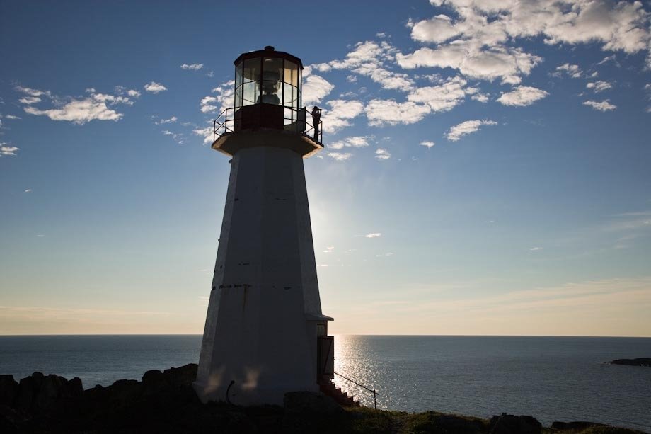 Quirpon lighthouse & tourist.