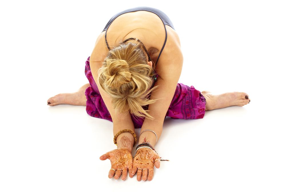 Cow face pose with fold