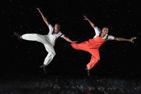 Sean and John Scott In Water by Cassandra Plavoukos