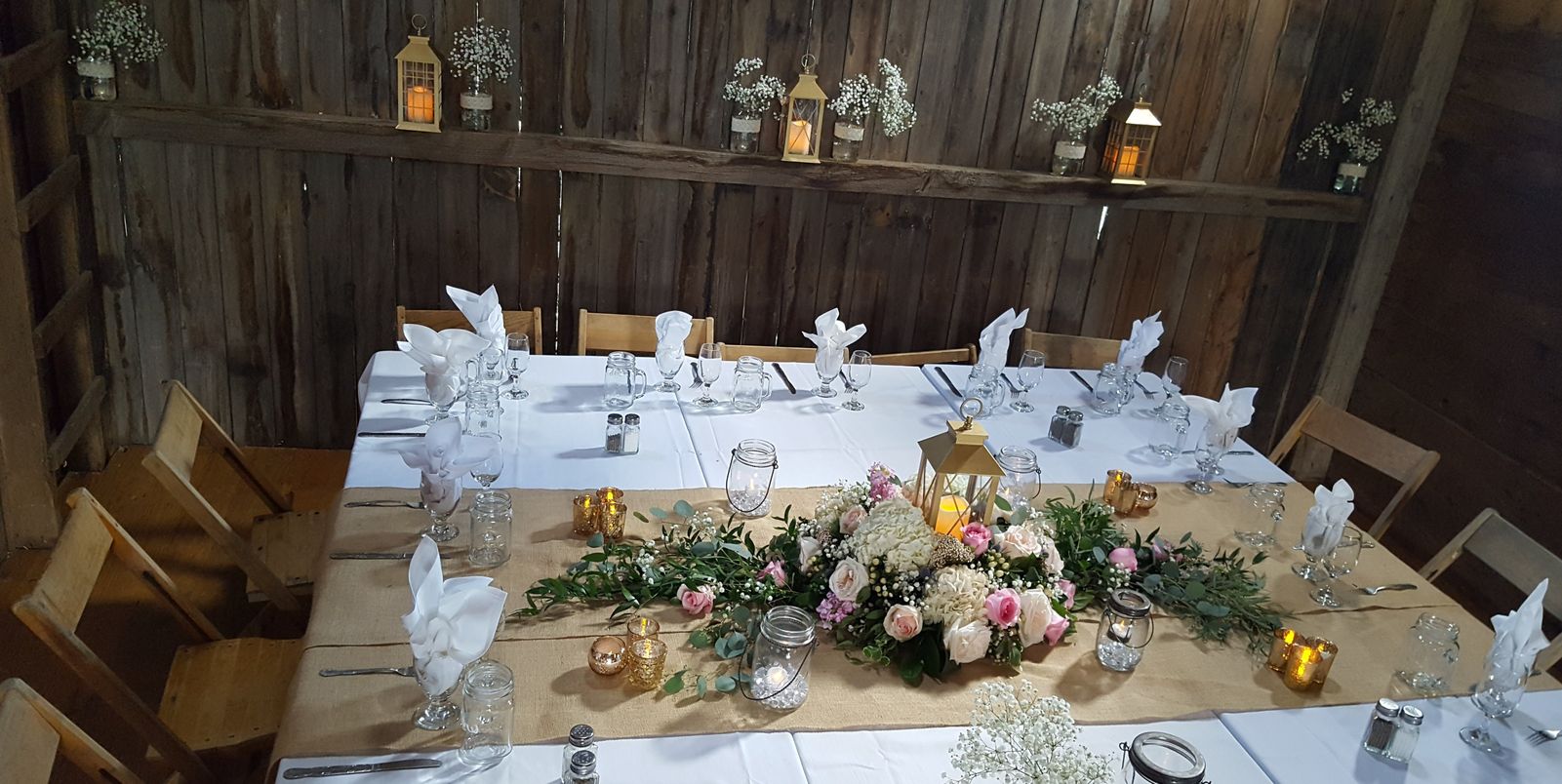Wedding flowers, Ellis Barn, romantic, rustic, garden, style, decor, lanterns, roses, baby's breath, head table Bridal Party Table, Ellis Barn