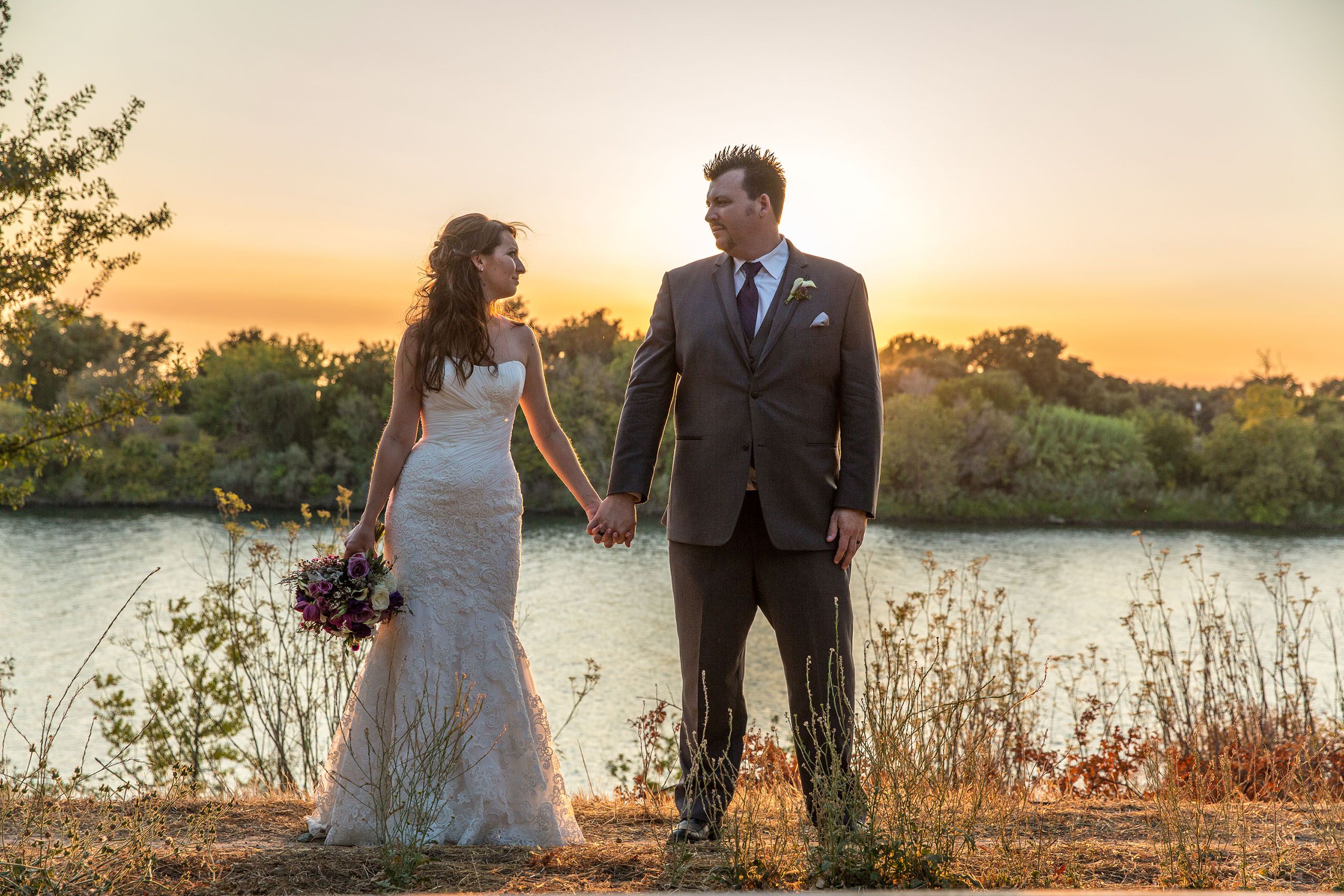 Delta bride and groom at sunset