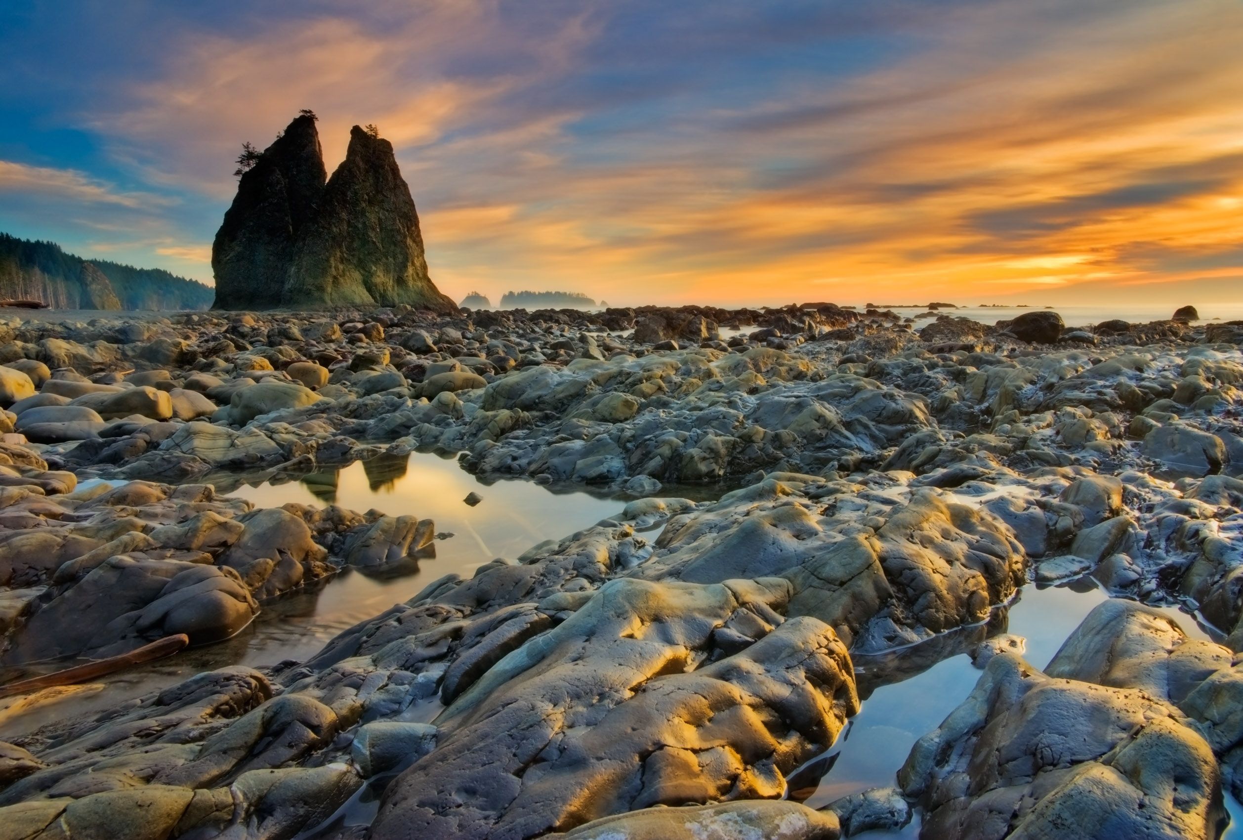 Olympic National Park, Washington. Judges' Choice Award, North American Nature Photography Association (NANPA) Showcase 2009 competition and Expressions publication. Selected for the Premiere Collection of the Pentax Photo Gallery. Rialto Seastack Sunset
