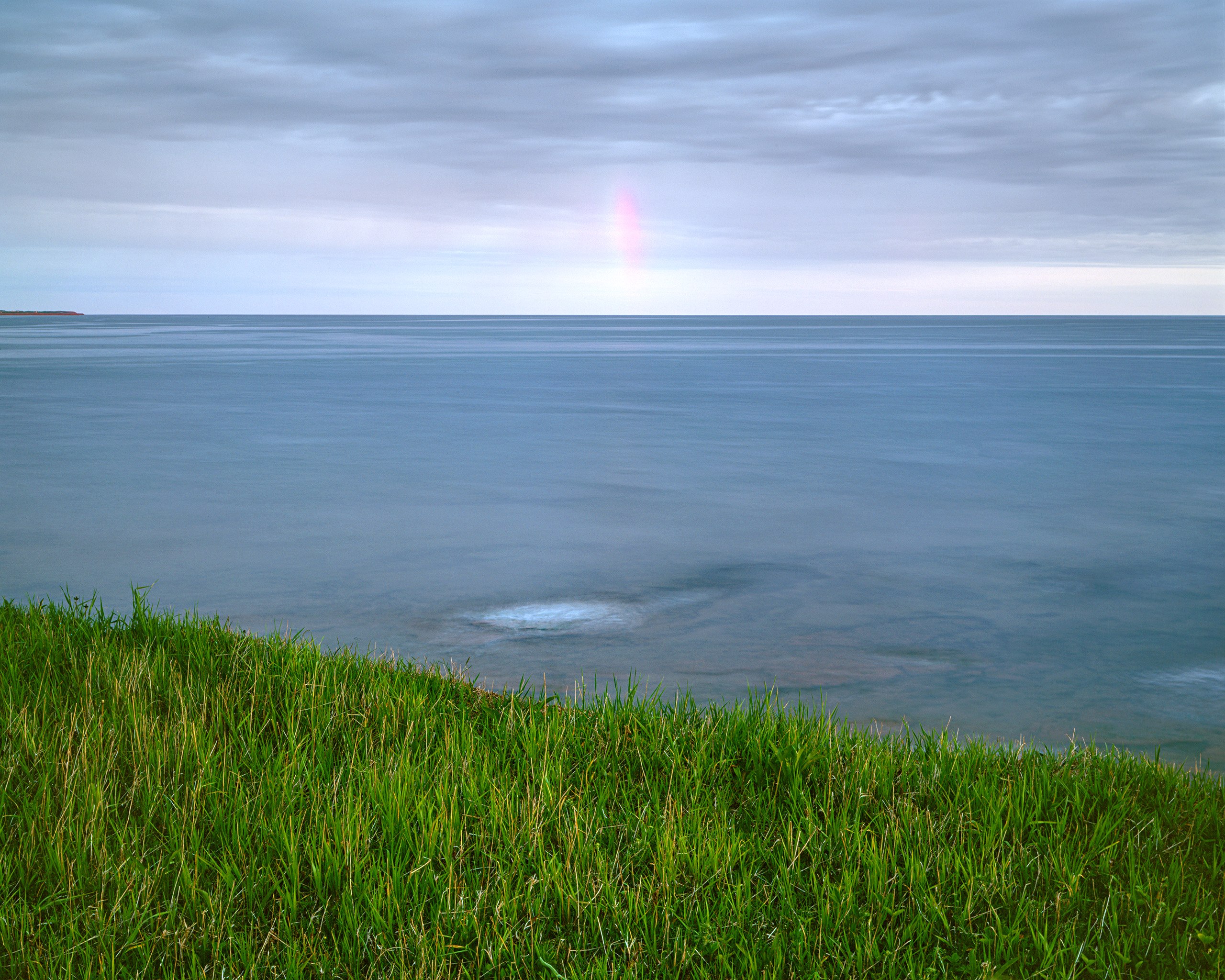 Rainbow at Sunset, Gulf of St. Lawrence, near French River, Prince Edward Island, Canada