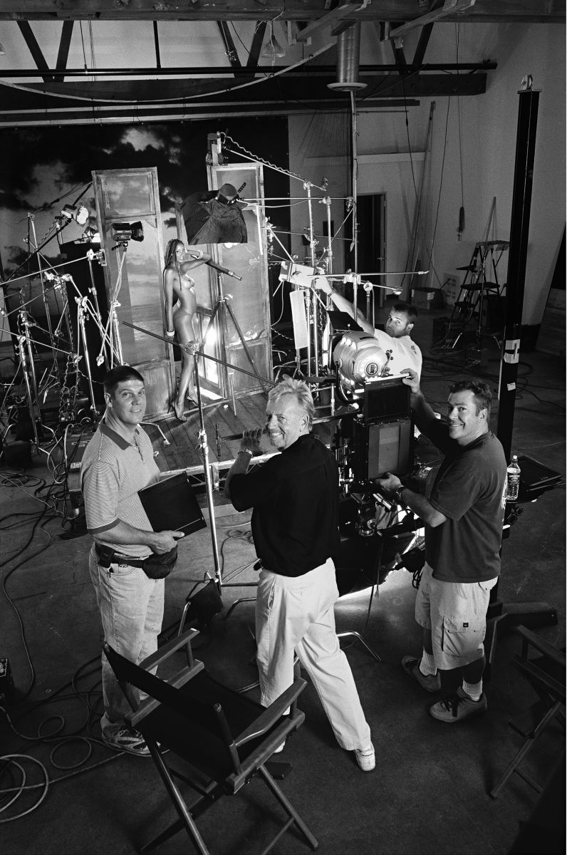 ARNY FREYTAG WITH CREW AND MODEL ON A PLAYBOY CENTERFOLD SHOOT