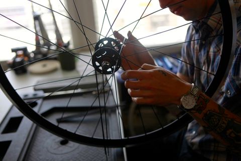 Builder, James Bringman works on a bike at Mission Bicycle Company which specializes in fixed gear bikes in San Francisco, California., on  May 1st , 2012. fixie.jpg