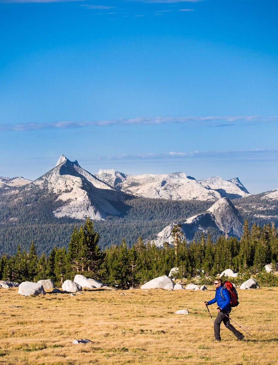 Hiker in Yosemite High Country with Cathedral Peak in Background