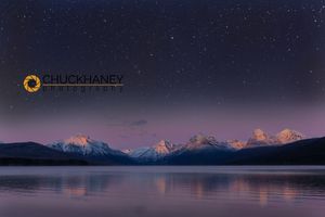 A time lapse composite image of stars over the peaks of Lake McDonald in Glacier National Park, Montana, USA Lake McDonald Stars