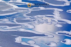 Looking down on ice patterns forming on Swiftcurrent Lake in early winter in Glacier National Park, Montana, USA Swiftcurrent Ice