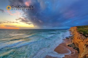 Sea cliffs catch days last light at Pomponi State Beach in San Mateo County, California, USA Pomponi