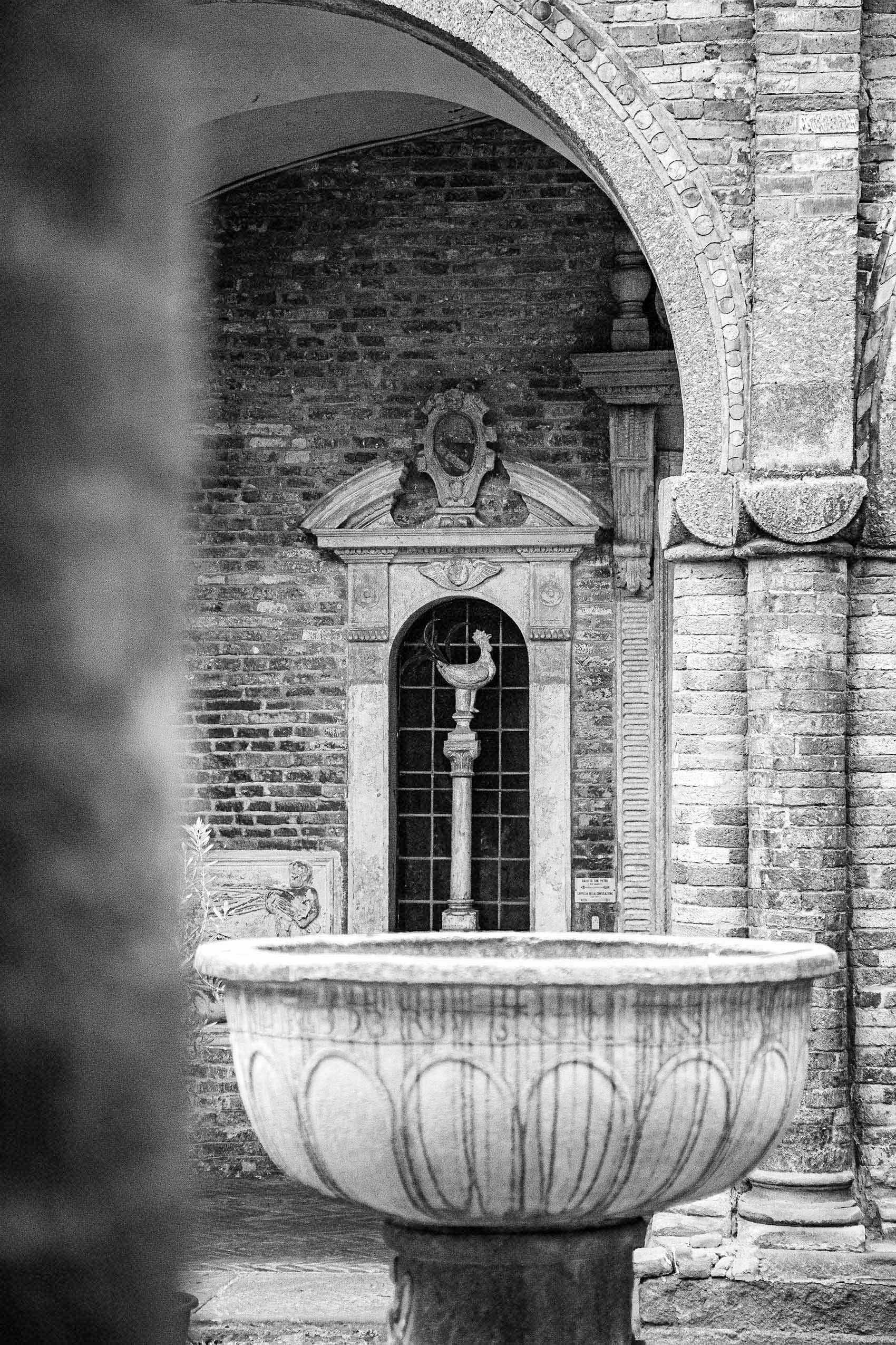 The symbol of Saint Peter's Denial under the porticoes of Pilate's Courtyard. Saint Peter's Rooster