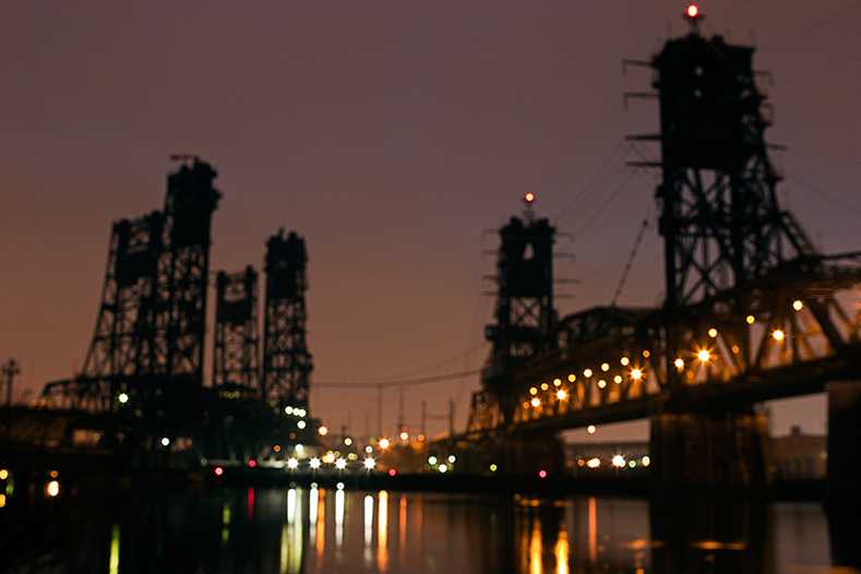 Night view of NJ Transit and Route 9 truck bridges heading east into Jersey City NJ. Twin Bridges, 2006