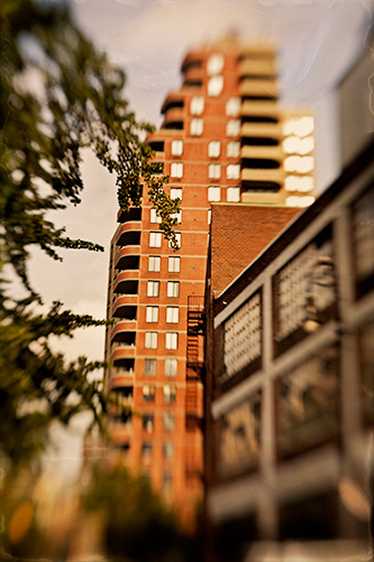 View East toward Washington Street past the old and new on the West side of Greenwich Village. West 11th Street, New York City 2008
